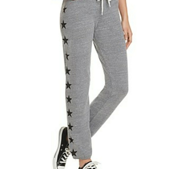 grey sweatpants with black stars